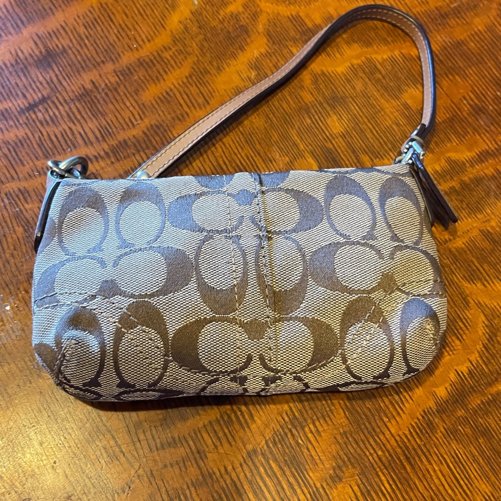 Coach monogram brown pouch bag